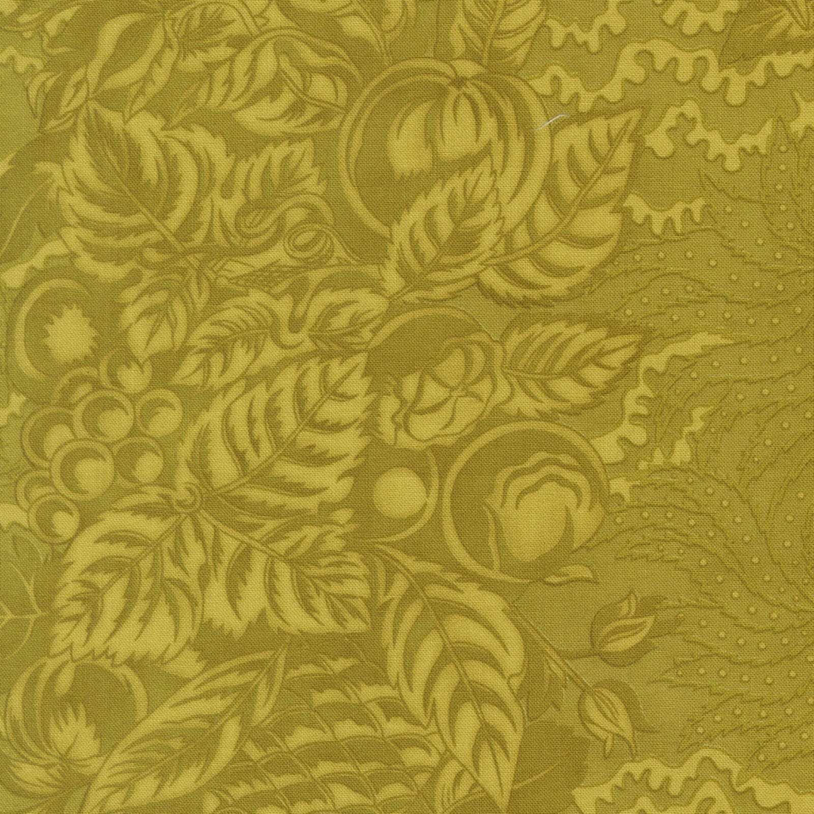 A close-up of a fabric pattern featuring a muted olive green and mustard yellow botanical design with leaves, grapes, and abstract floral motifs.
