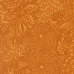 Orange floral and leaf patterned fabric texture