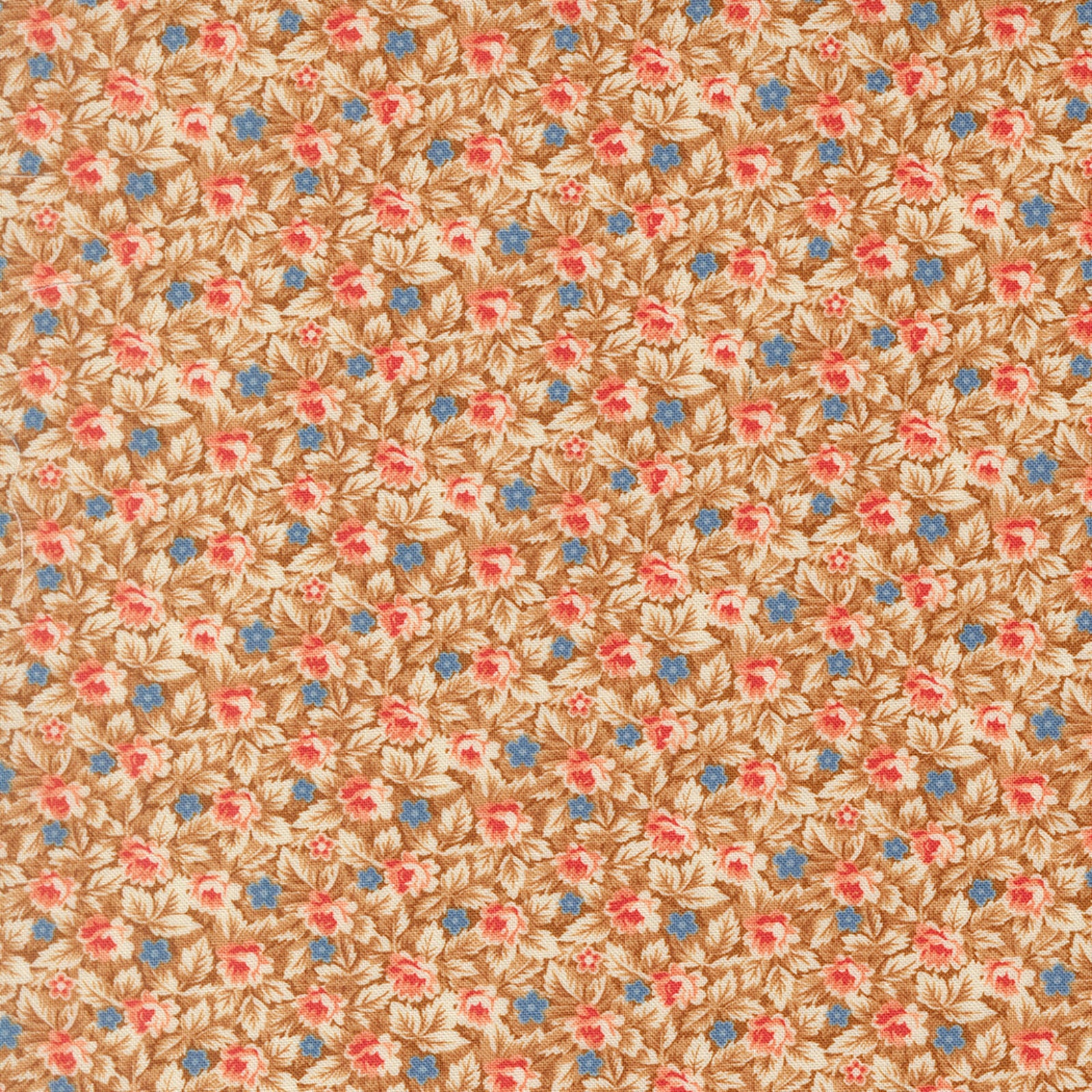 A close-up of a repeating floral pattern with small pink and blue flowers, cream petals, and brown leaves on a warm tan background.