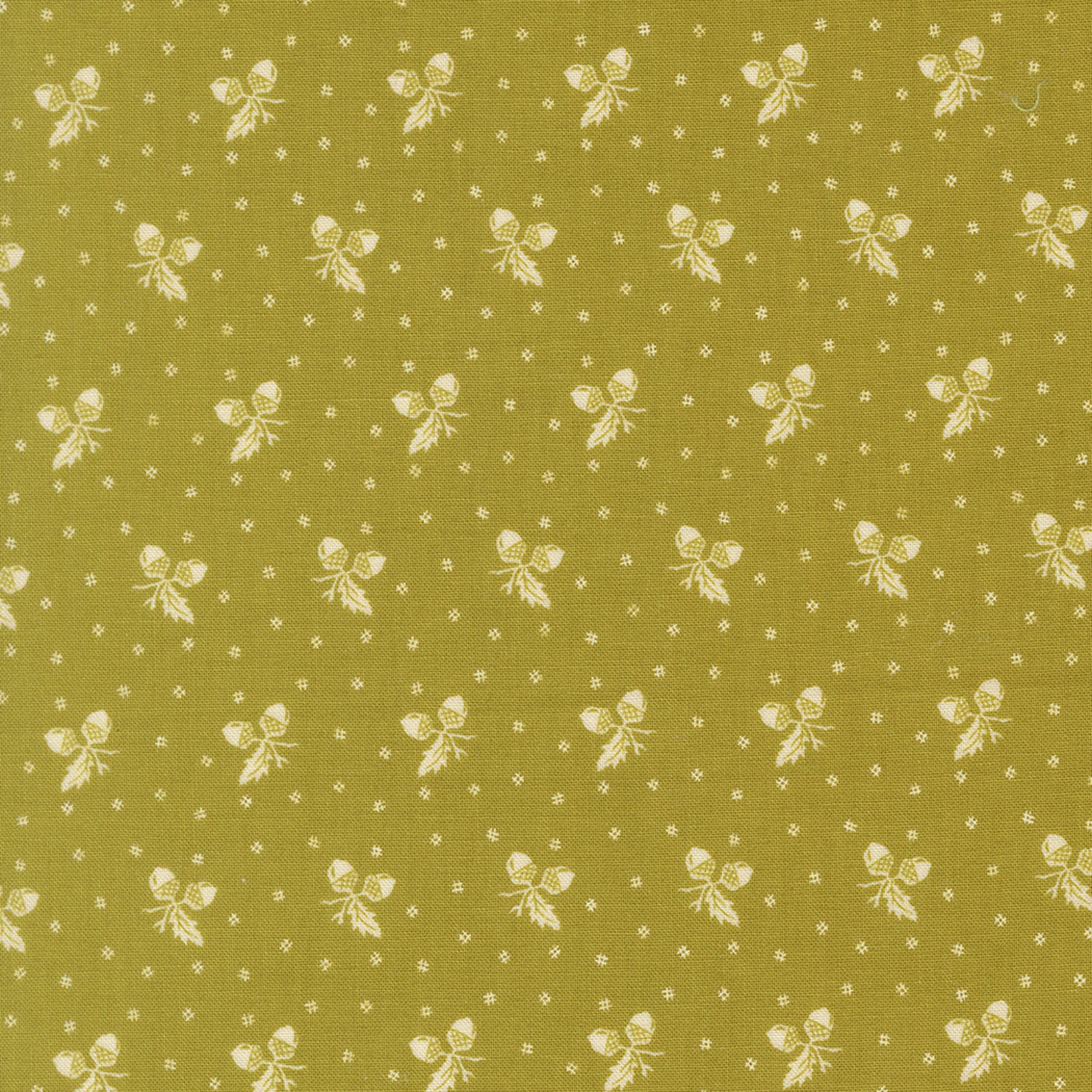 Olive green fabric with a repeating cream pattern of small bows, tiny diamonds, and scattered dots.