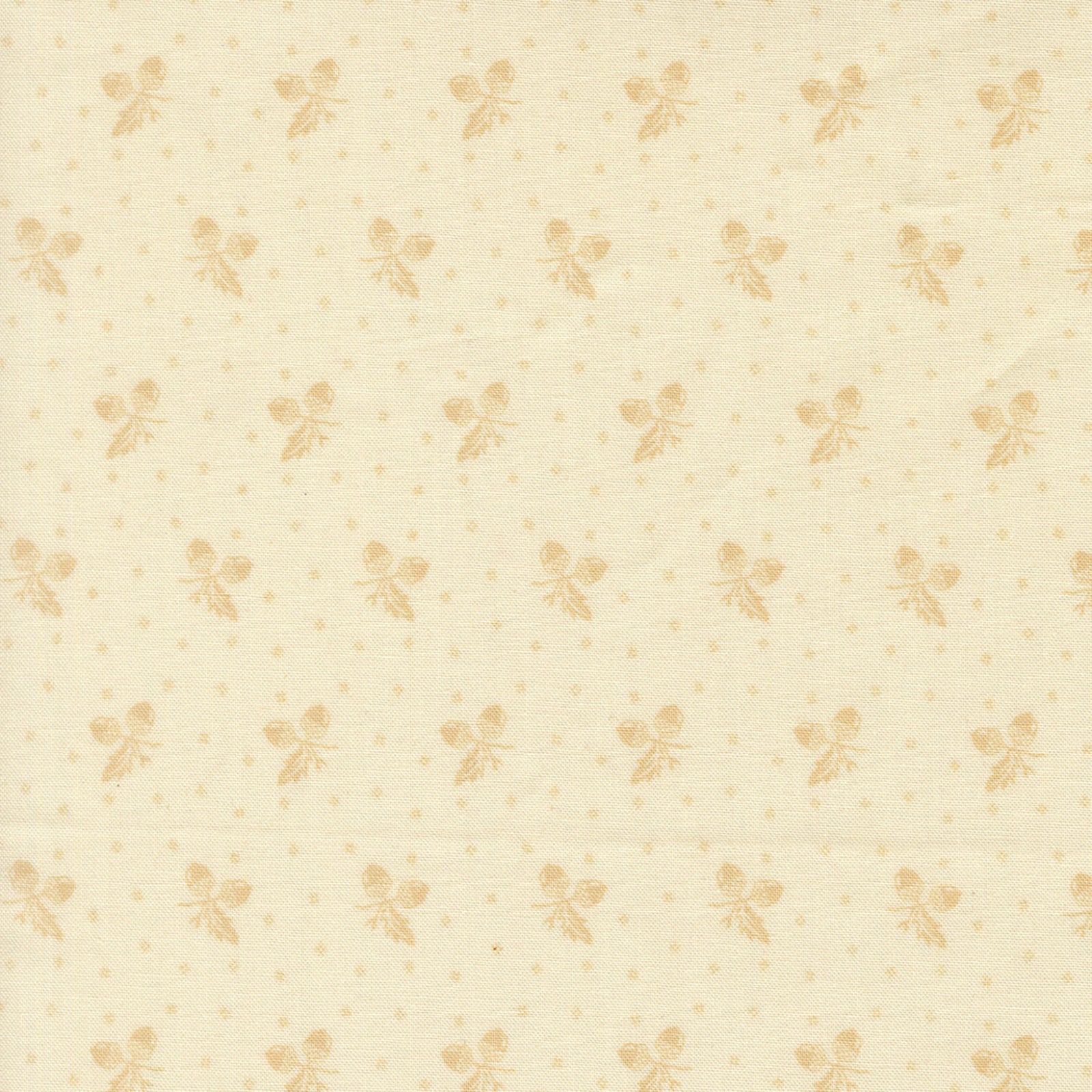 Patterned fabric with small floral elements on a beige background