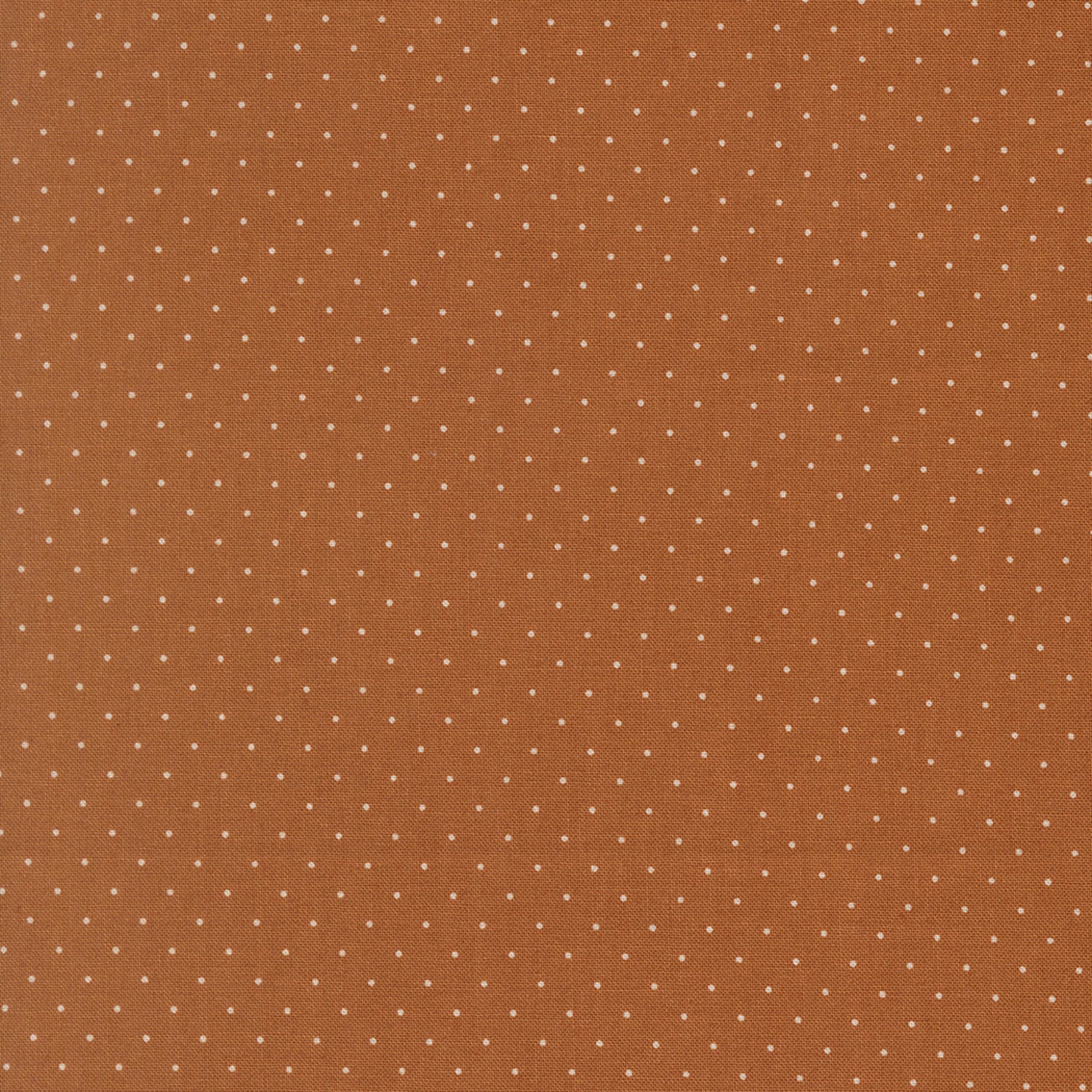Brown fabric with small white polka dots