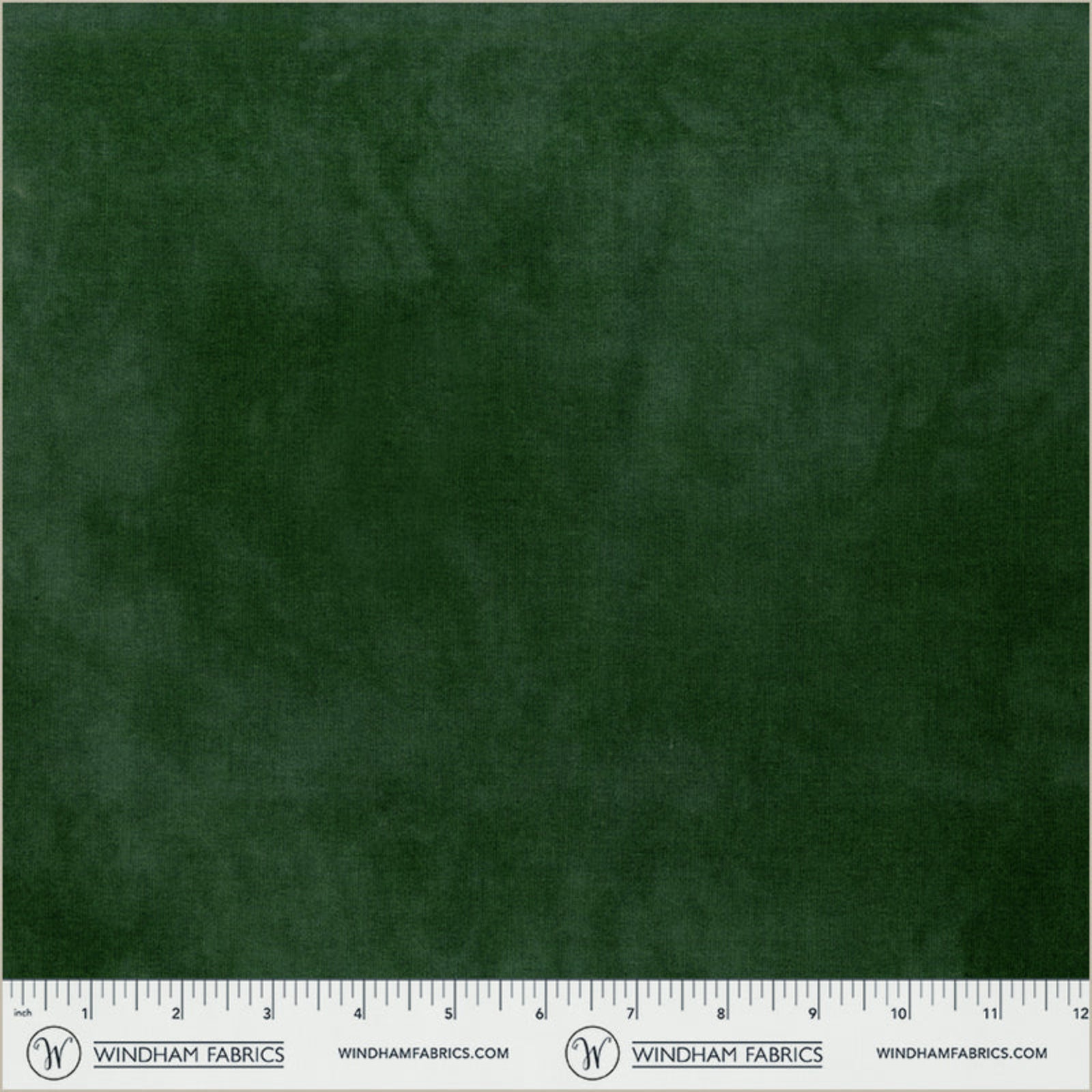 Solid green fabric swatch with a ruler at the bottom for scale.
