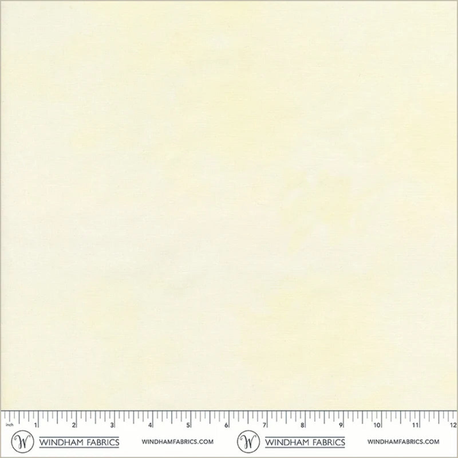A square swatch of cream-colored fabric with a subtle textured pattern, featuring a printed ruler scale and the Windham Fabrics logo along the bottom edge.