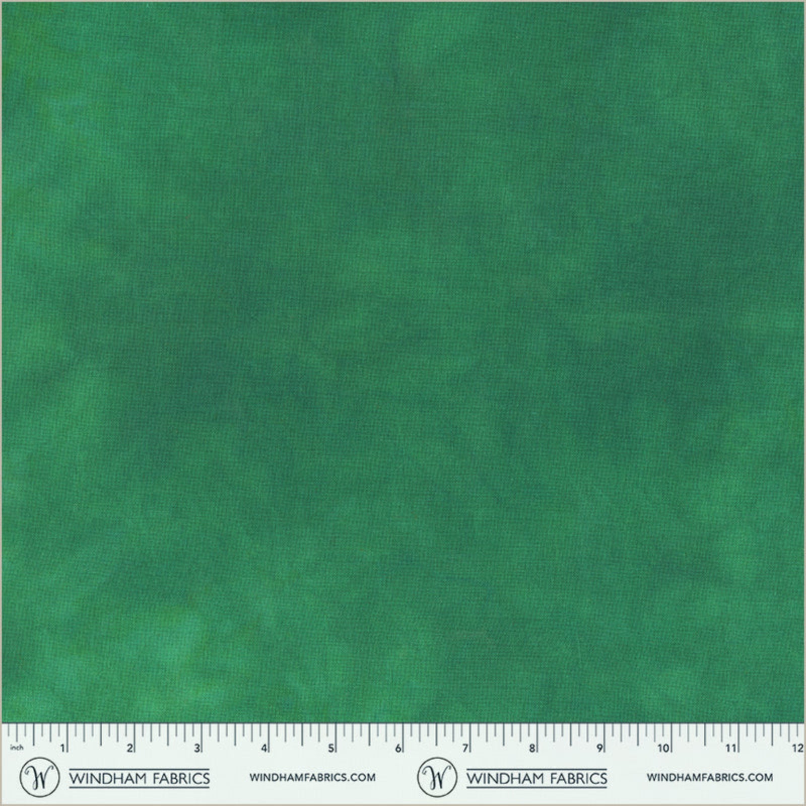 Green fabric swatch with a ruler at the bottom for scale, branded 'Windham Fabrics'.