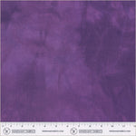 Purple fabric with a subtle pattern and a ruler at the bottom for scale, branded 'Windham Fabrics'.