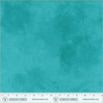 Teal fabric swatch with a ruler at the bottom for scale, branded 'Windham Fabrics'.