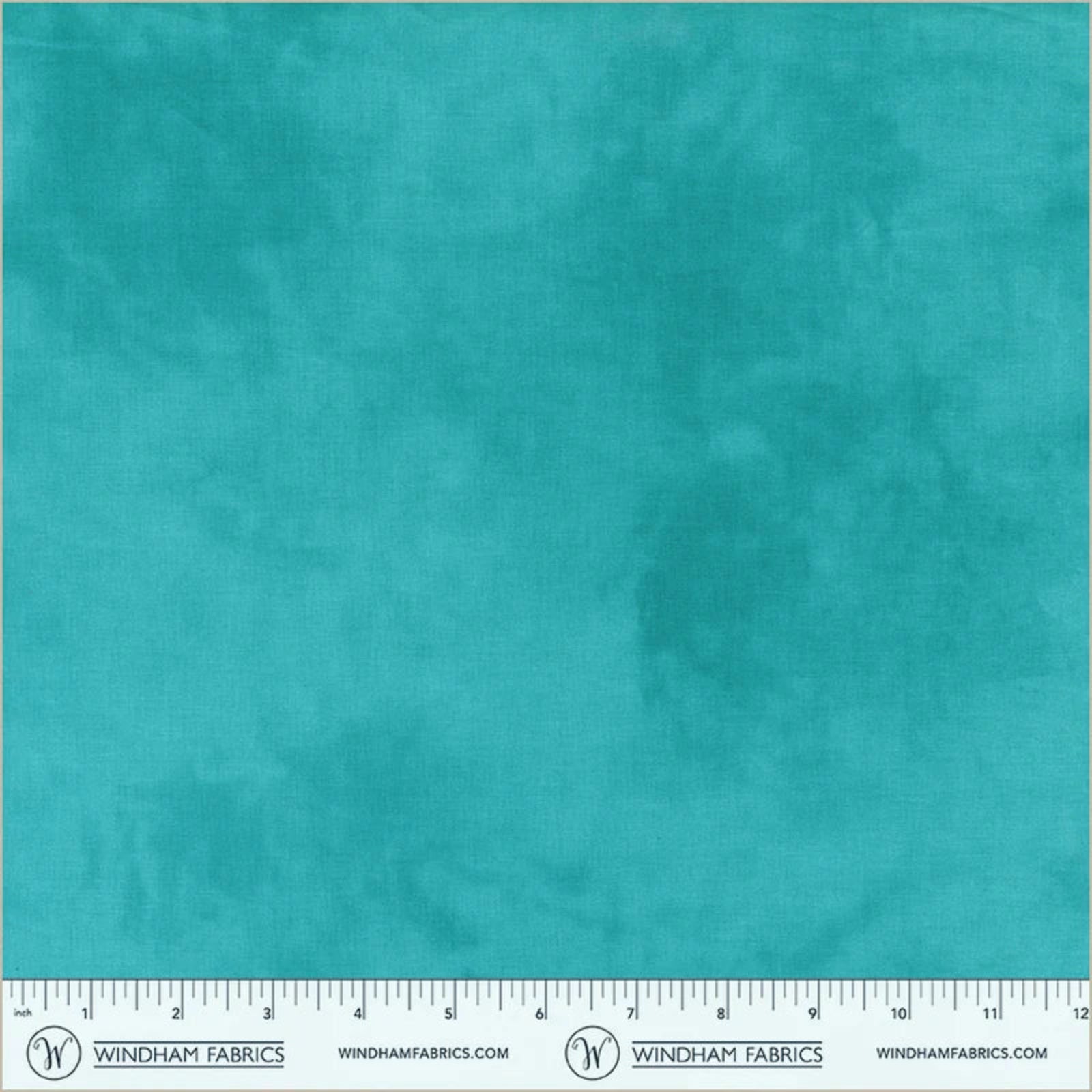 Teal fabric swatch with a ruler at the bottom for scale, branded 'Windham Fabrics'.