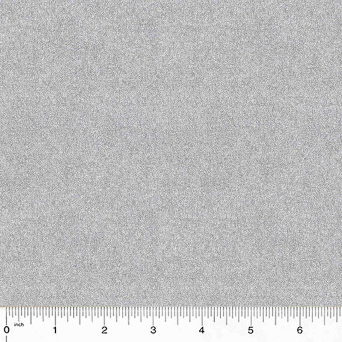 Silver fabric with a ruler at the bottom for scale