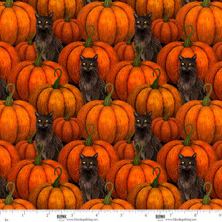Fabric with pumpkins and cats pattern