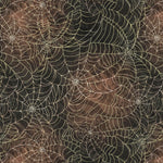 Pattern of spider webs on a brown background