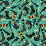 Pattern of witch boots, cats, and moon phases on a teal background