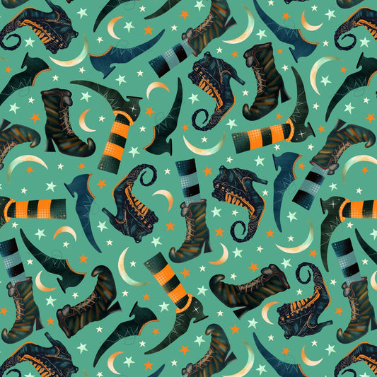 Pattern of witch boots, cats, and moon phases on a teal background