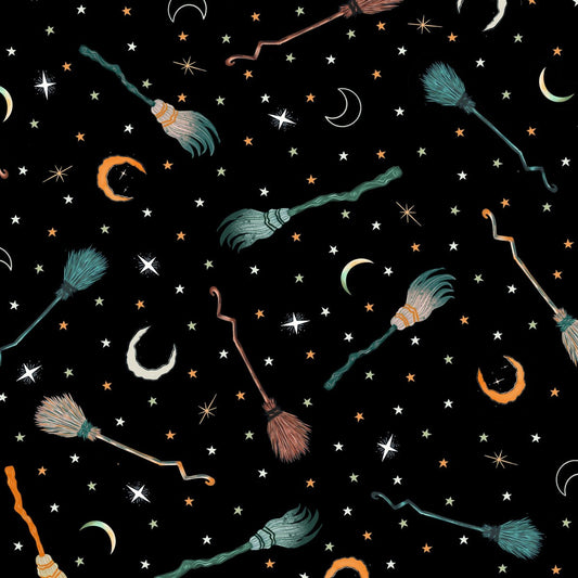 Pattern of witch brooms and celestial elements on a black background