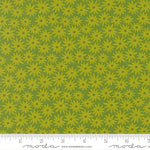 Green floral pattern fabric with a ruler at the bottom