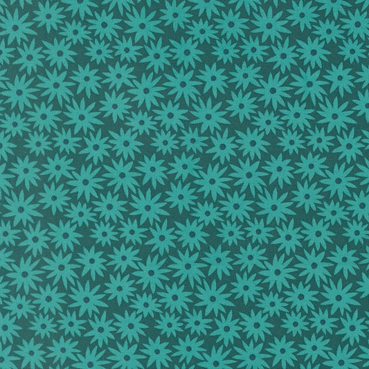 Pattern of teal flowers on a dark teal background