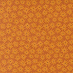 Pattern of yellow flowers on a brown background