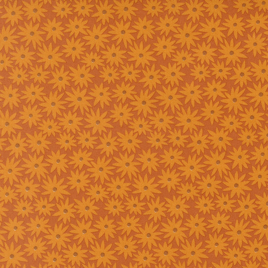 Pattern of yellow flowers on a brown background