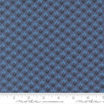 Patterned fabric with blue flowers on a blue background