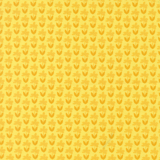 Yellow patterned background with small floral shapes