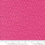 Pink fabric pattern with a ruler at the bottom for scale