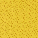Yellow patterned fabric with star shapes