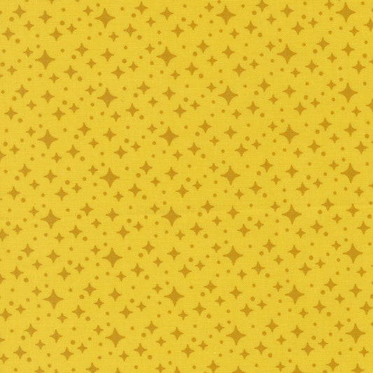 Yellow patterned fabric with star shapes