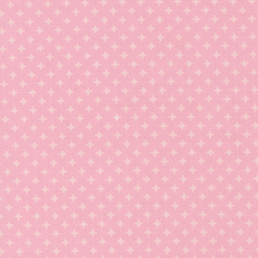 Pink fabric with small white star diamond pattern