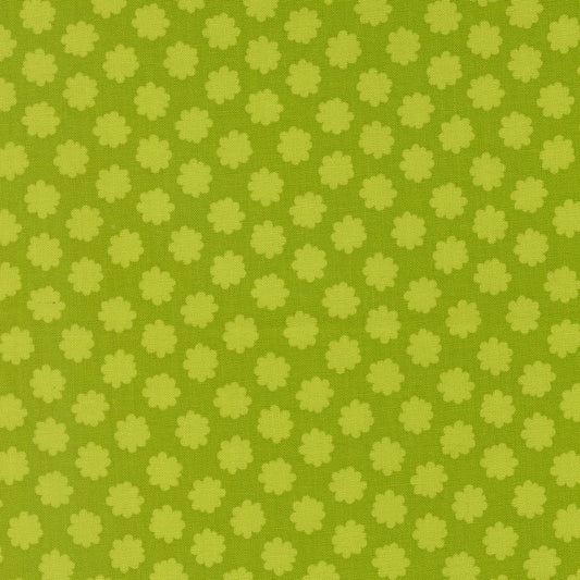 Green patterned fabric with small floral shapes