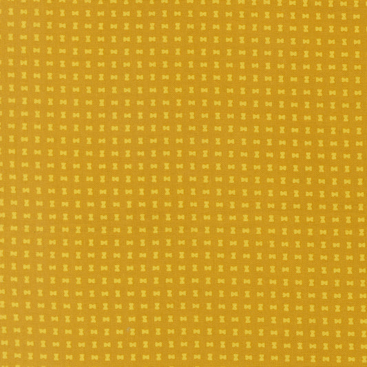 Pattern of small yellow squares on a yellow background