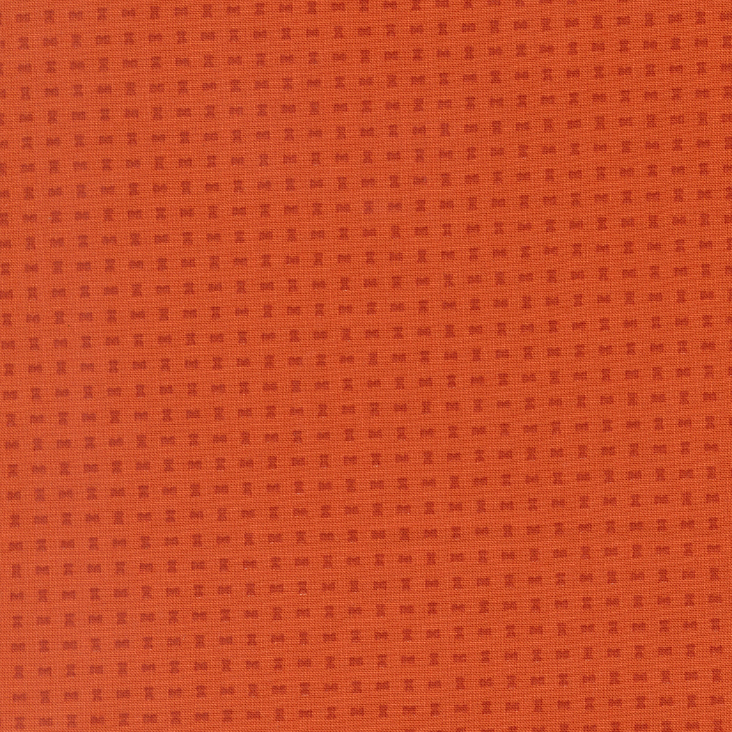 Brown fabric texture with a subtle pattern