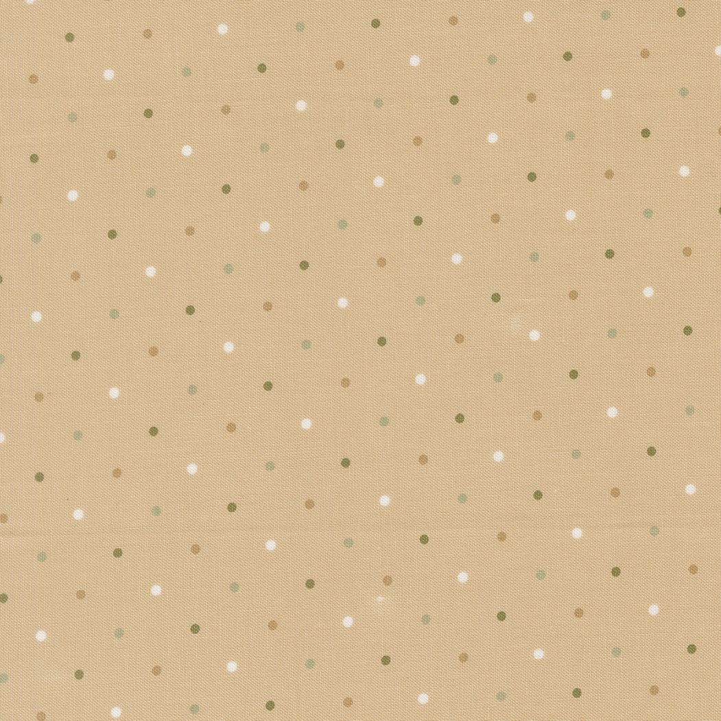 Beige fabric with small polka dot pattern