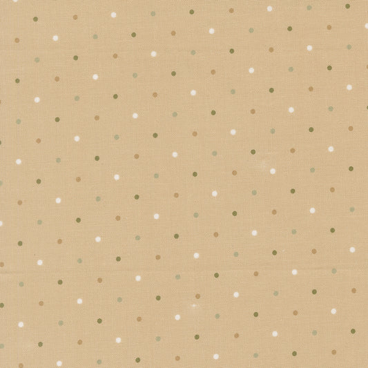 Beige fabric with small polka dot pattern