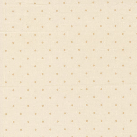 Pattern of small beige dots on a light beige background