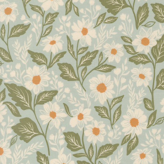 Floral pattern with white flowers and green leaves on a light blue background