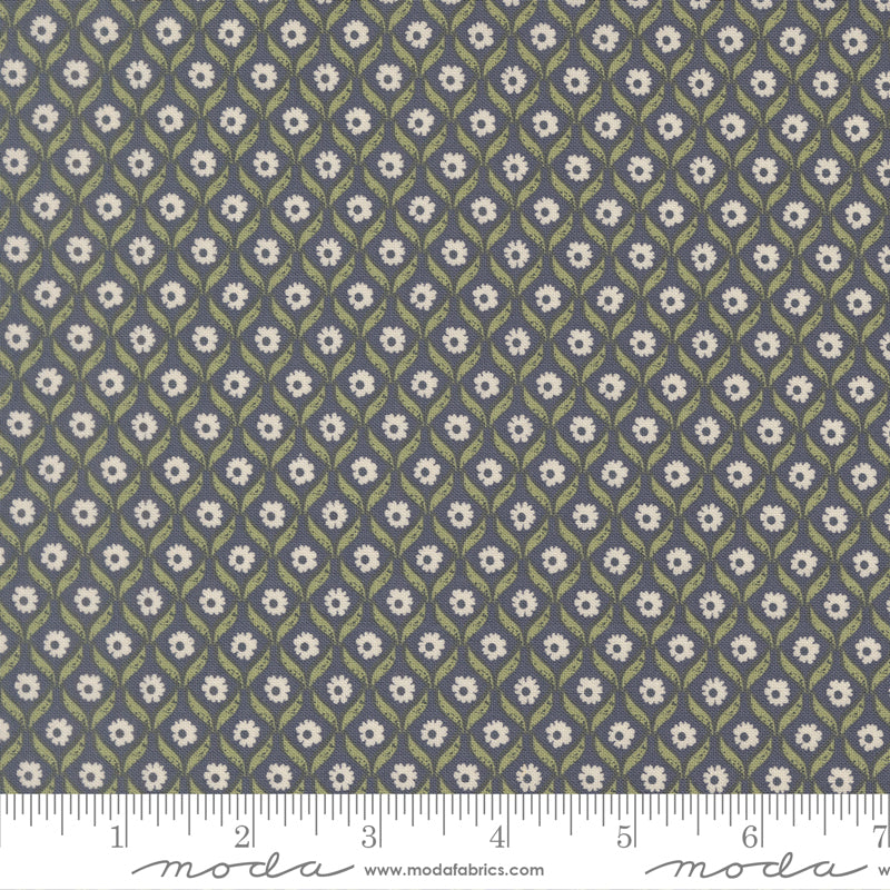 Floral patterned fabric with a ruler at the bottom for scale