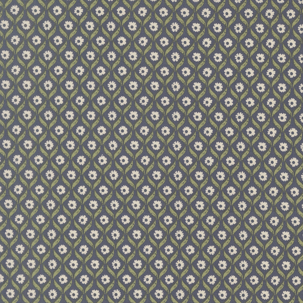 Patterned fabric with small white flowers on a dark blue background