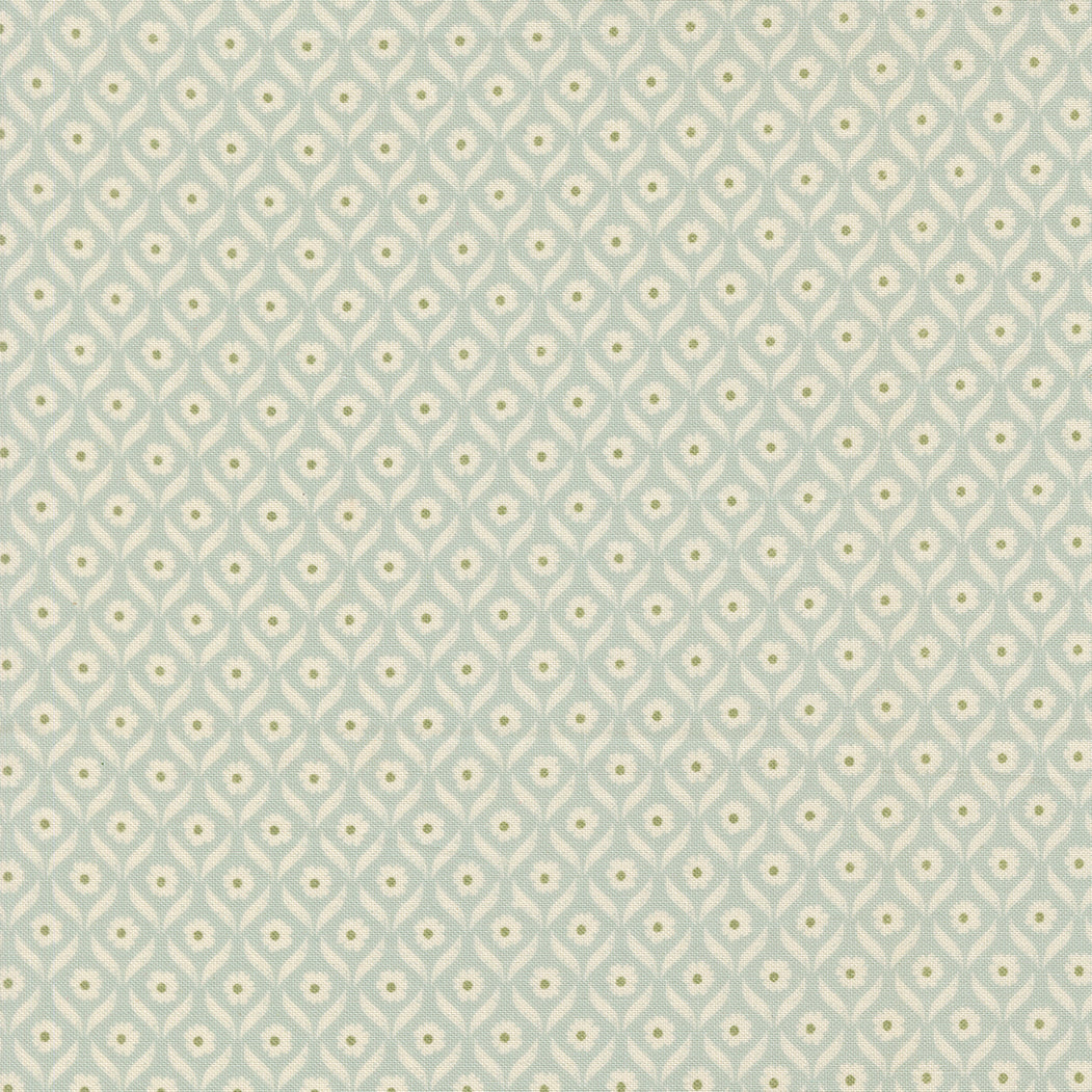 Patterned fabric with small floral design on a light blue background