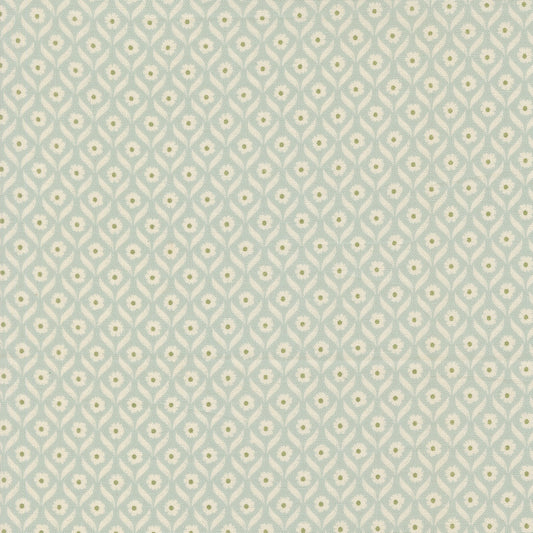 Patterned fabric with small floral design on a light blue background