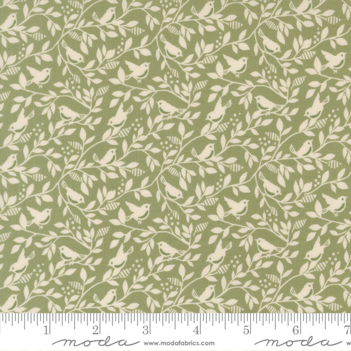 Fabric pattern with birds and leaves on a green background, featuring Moda label.