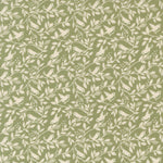 Pattern of birds and branches on a green background
