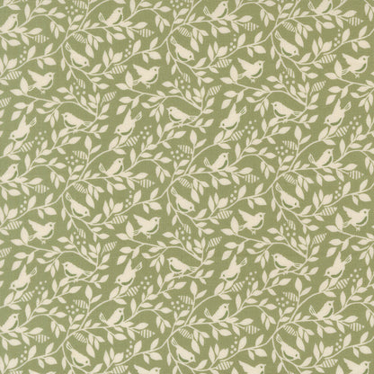 Pattern of birds and branches on a green background