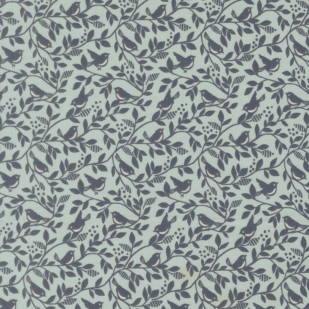Pattern of birds and branches on a light blue background