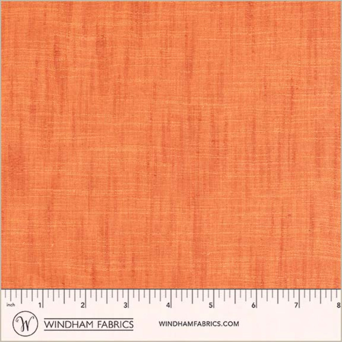 Orange fabric swatch with a ruler at the bottom for scale, branded 'Windham Fabrics'.