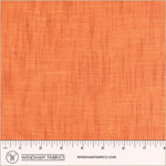 Orange fabric swatch with a ruler at the bottom for scale, branded 'Windham Fabrics'.