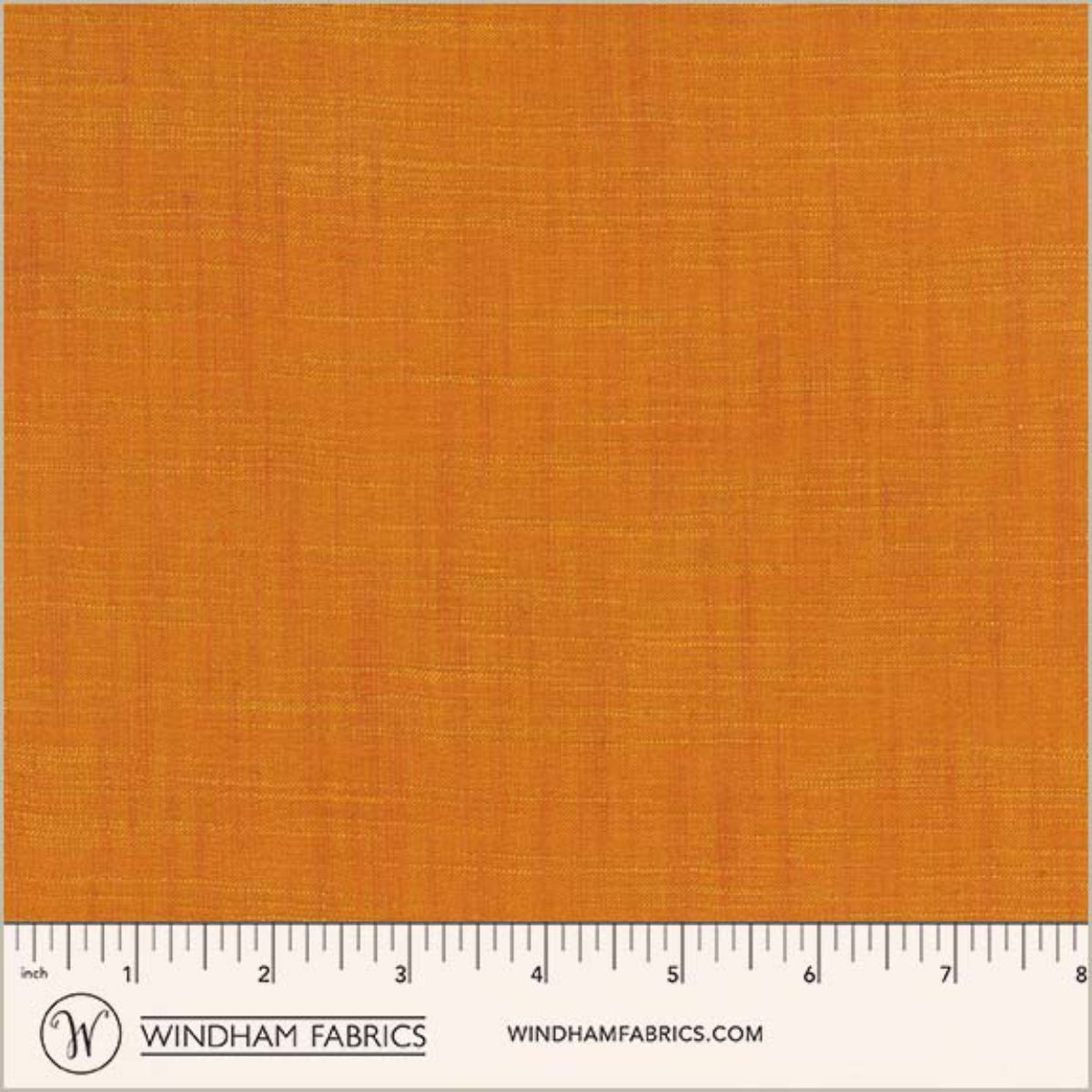 Orange fabric swatch with a ruler at the bottom for scale, branded with Windham Fabrics.