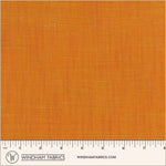 Orange fabric swatch with a ruler at the bottom for scale, branded with Windham Fabrics.