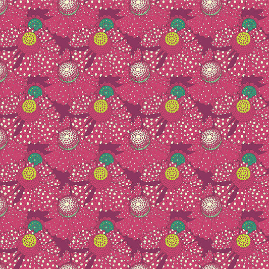 Patterned fabric with colorful design on a pink background