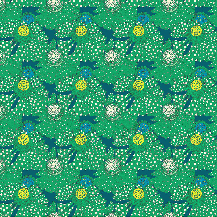 Patterned fabric with blue and green shapes on a green background