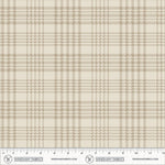 A close-up of a plaid fabric pattern with warm beige and taupe lines on an off-white background, shown with a measuring ruler along the bottom edge from Windham Fabrics.